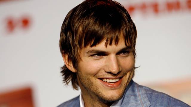 Ashton Kutcher smiles at premiere of "Open Season" in Los Angeles