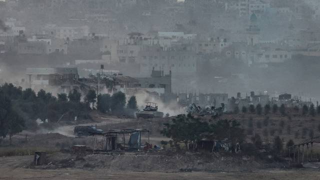 Israeli tank maneuvers in Gaza as seen from Southern Israel, amid the ongoing conflict between Israel and Palestinian group Hamas