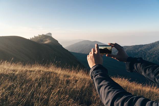 Travel,Accessories,For,Taking,Photo,By,Smart,Phone,hand,Holding,Smart