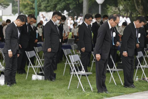 Participants including Hiroshima City Mayor Kazumi Matsui practice social distancing as they offers a silent prayers for the victims of the 1945 atomic bombing in Hiroshima