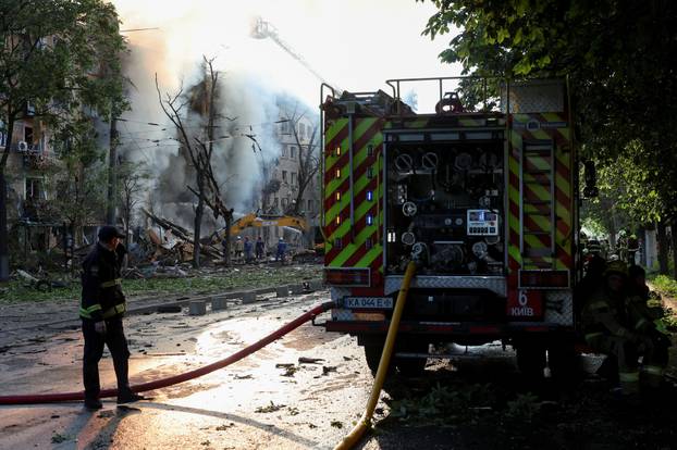 Site of an apartment building damaged during a Russian missile and drone strike, amid Russia's attack on Ukraine, in Kyiv