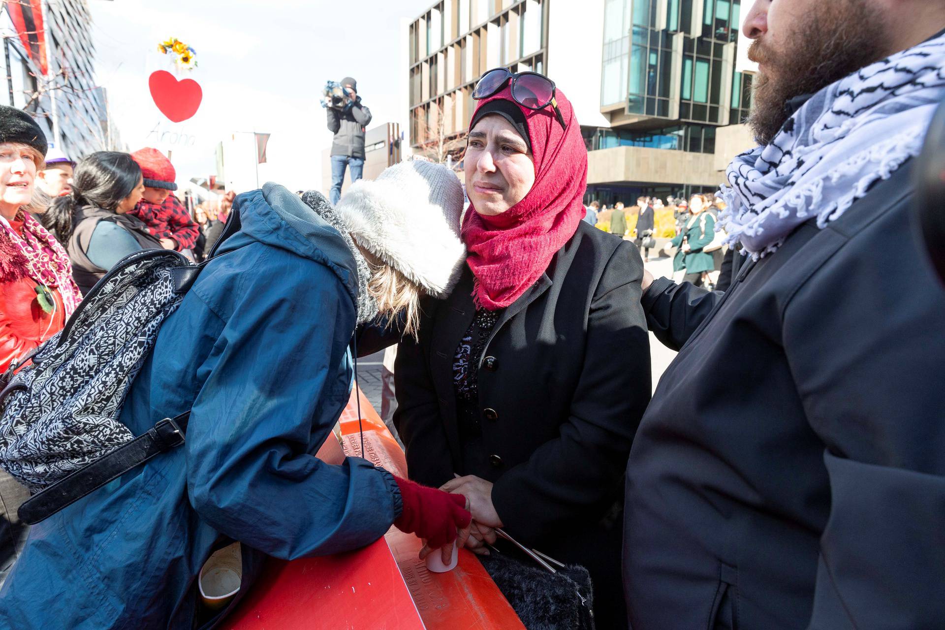 Mosque shooting survivors celebrate with supporters following the sentencing of gunman Brenton Tarrant in Christchurch