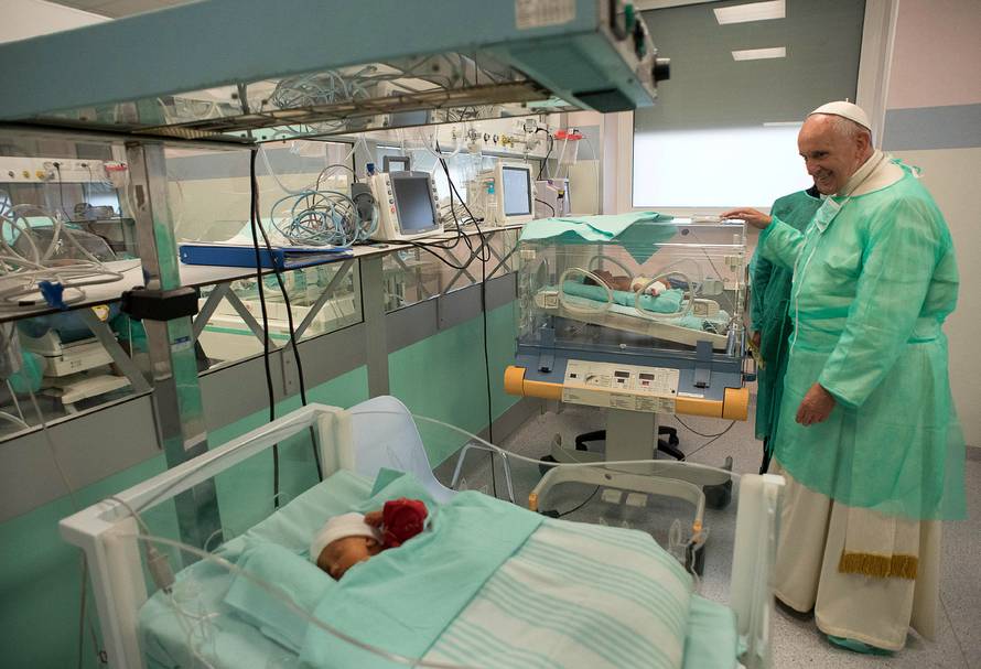 Pope Francis visits the intensive care nursery at the San Giovanni hospital in Rome