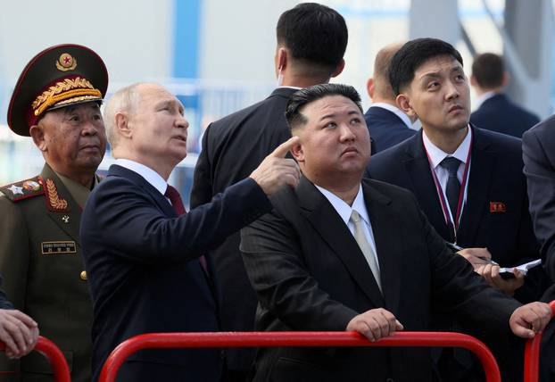 FILE PHOTO: Russia's President Putin and North Korea's leader Kim meet in Amur region