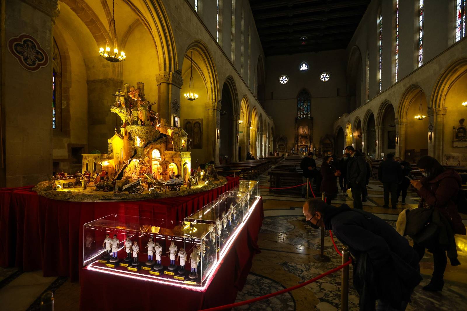 A large nativity scene whose base is also made of pizza to celebrate Christmas in the Basilica of Santa Chiara