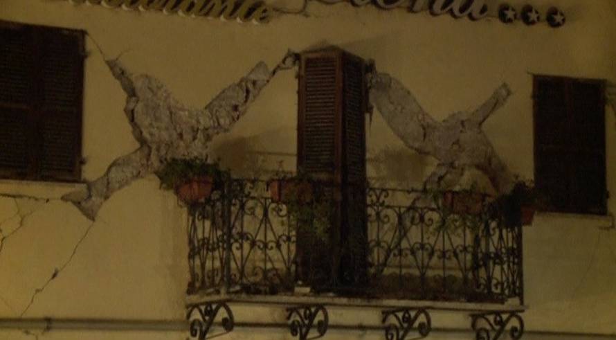 Still image from video shows cracks on the wall of a hotel after an earthquake in Visso