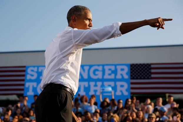 Obama departs after delivering remarks at a campaign event in Chapel Hill, North Carolina