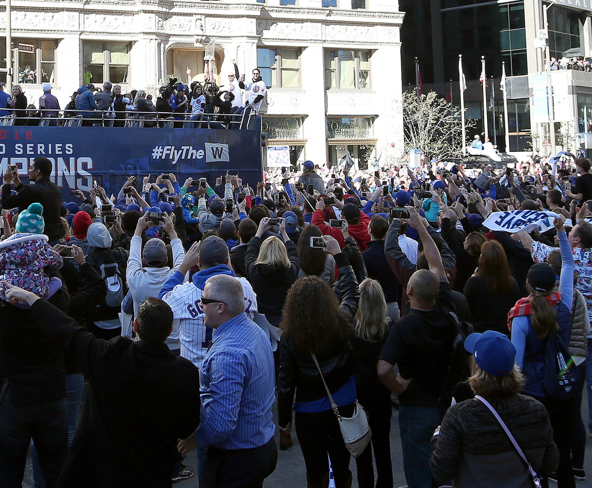 Chicago Cubs celebrate winning the team's first World Series in 108 years during a victory parade in Chicago