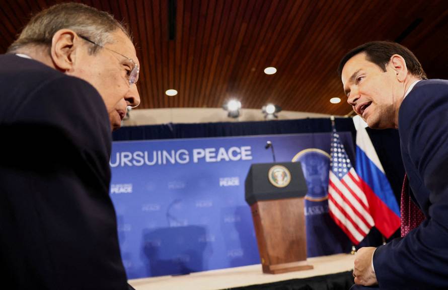 FILE PHOTO: U.S. President Trump meets with Russian President Putin in Alaska