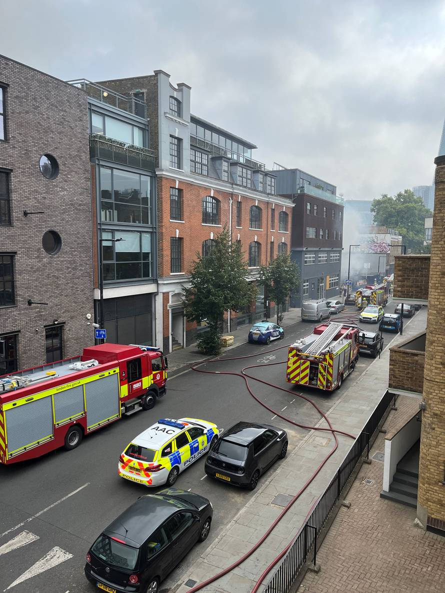 Smoke rises over the Union street after a fire broke out near the London Bridge