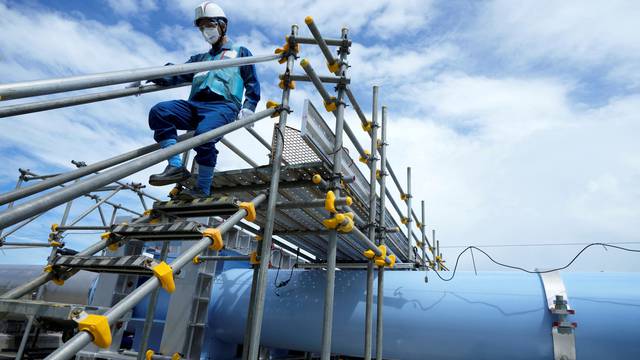 FILE PHOTO: TEPCO conducts media tour after Fukushima nuclear power plant treated radioactive water release began