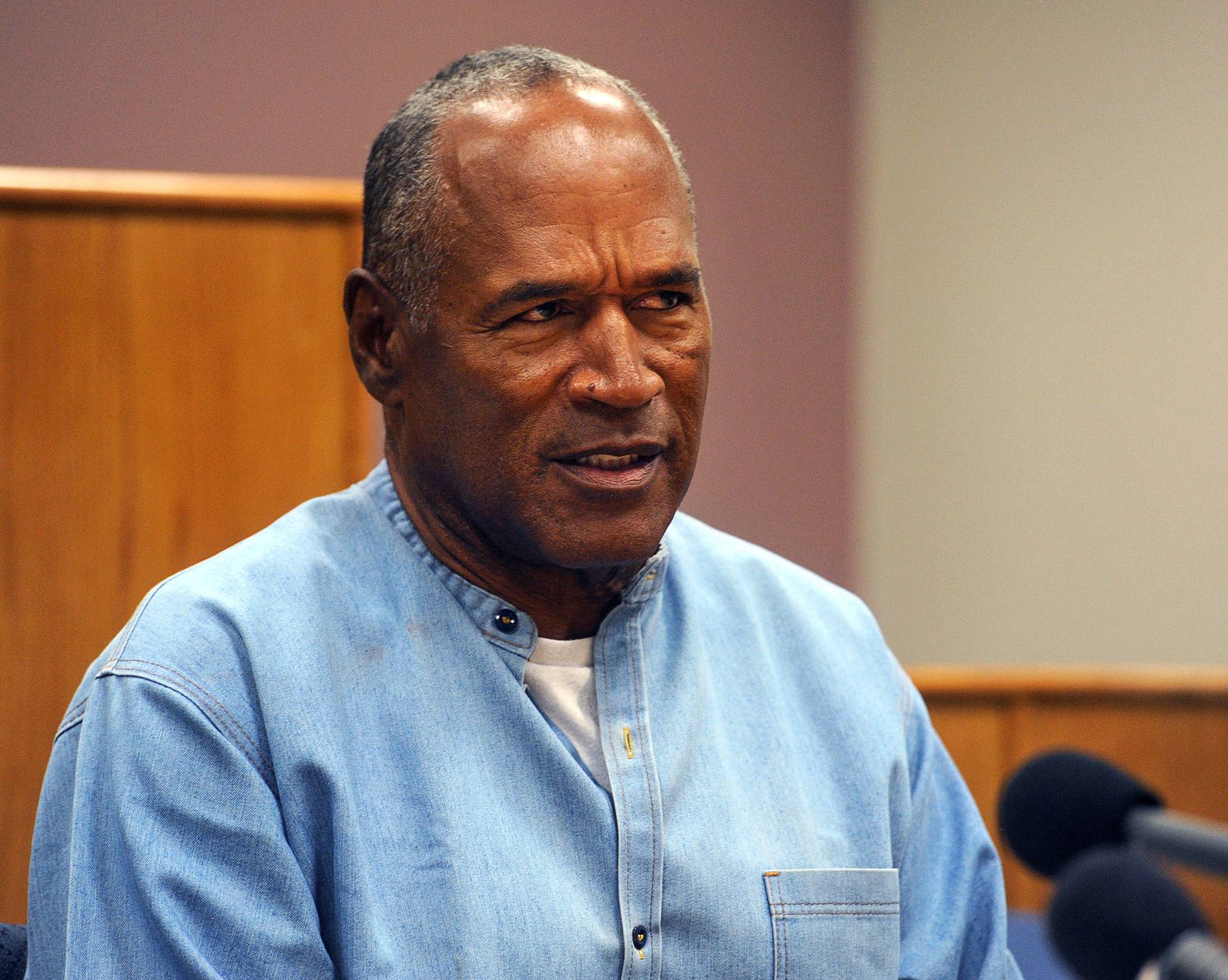O.J. Simpson reacts during his parole hearing at Lovelock Correctional Centre in Lovelock