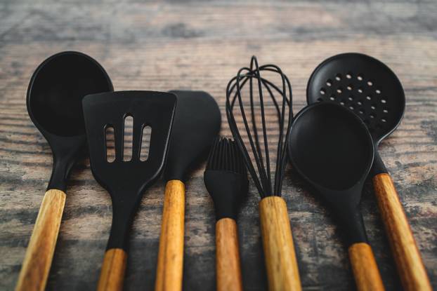 set of matching wooden and silicone kitchen utensils, cooking me