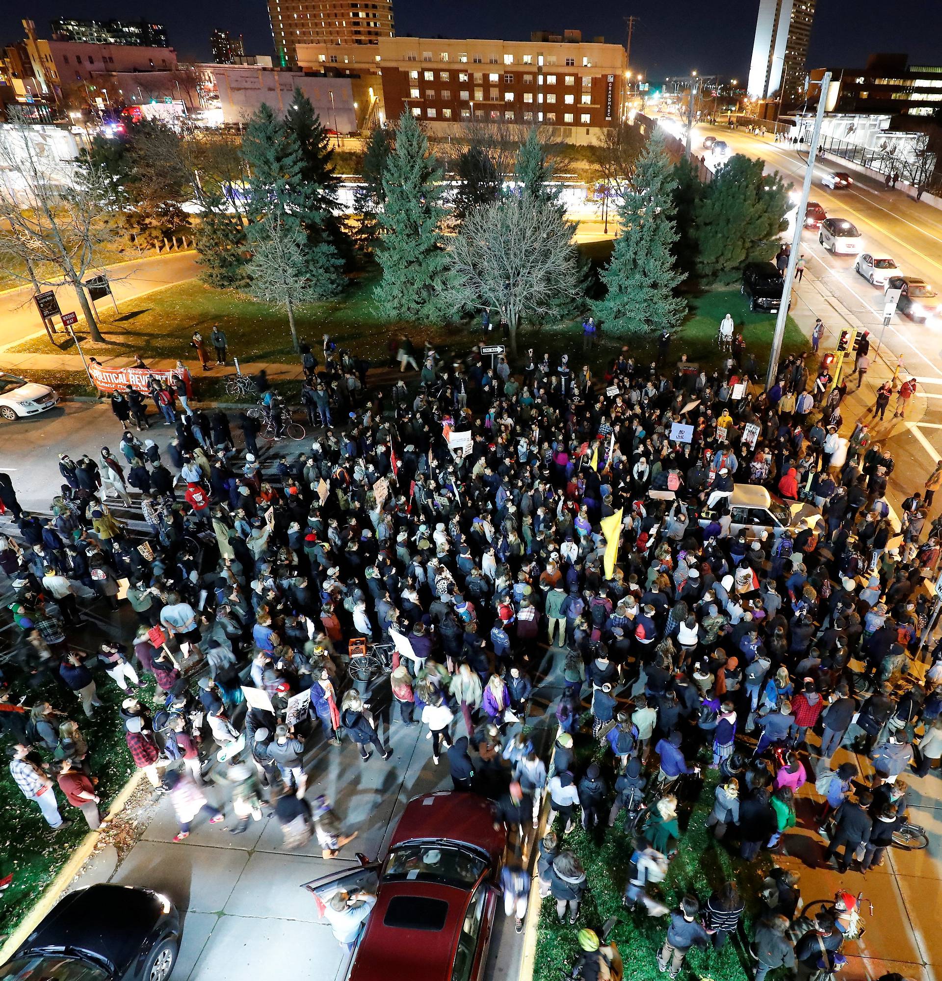 Demonstrators march as they shout slogans against President-elect Donald Trump in Minneapolis