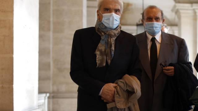 Bernard Tapie arrives at the Palais de Justice in Paris