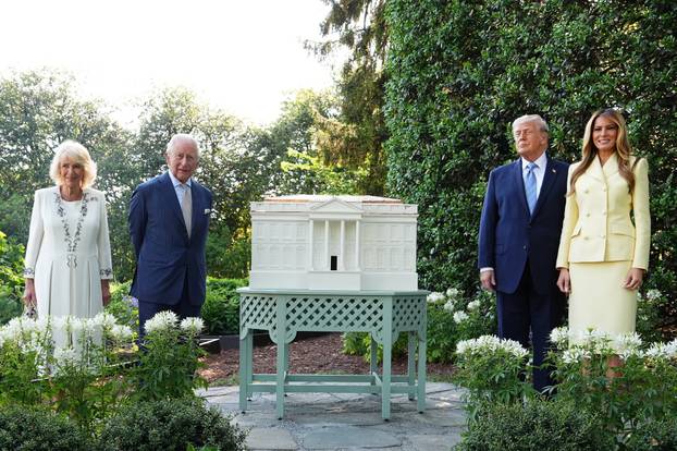 Britain's King Charles III and Queen Camilla join U.S. President Donald Trump and First Lady Melania for a tour of the White House beehives in the grounds of the White House