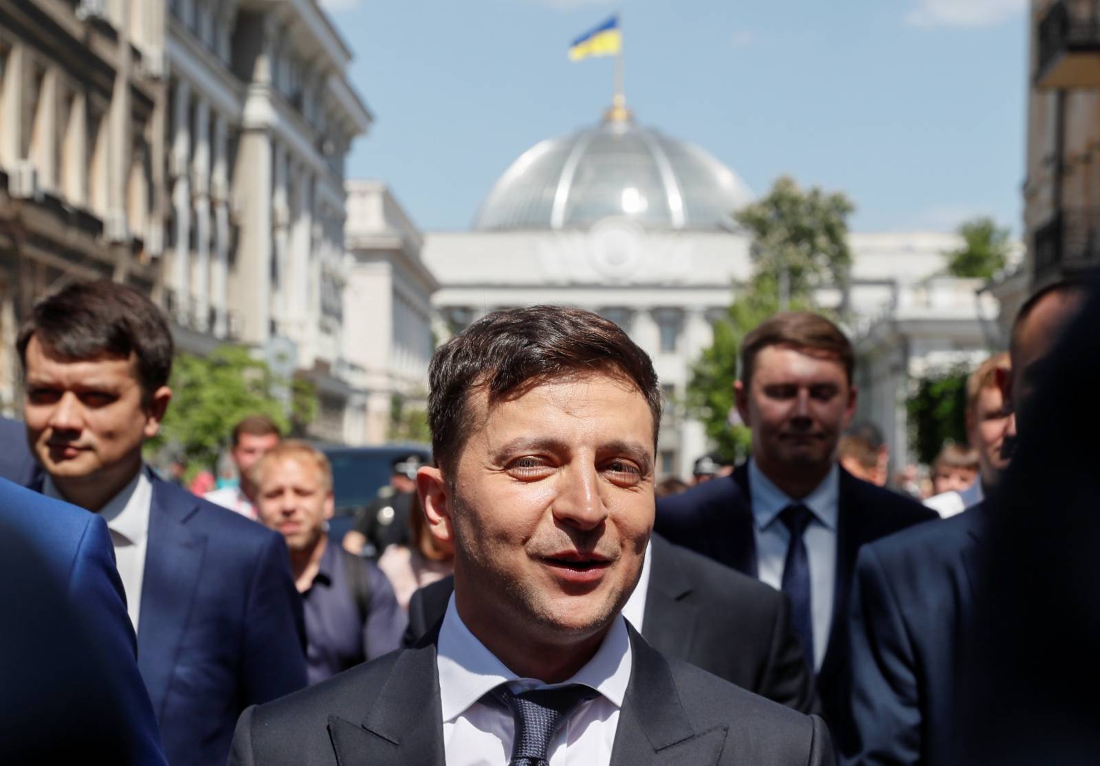 Ukraine's President Volodymyr ZelenskiyÂ walks from the parliament to the presidential administration office after his inauguration in Kiev