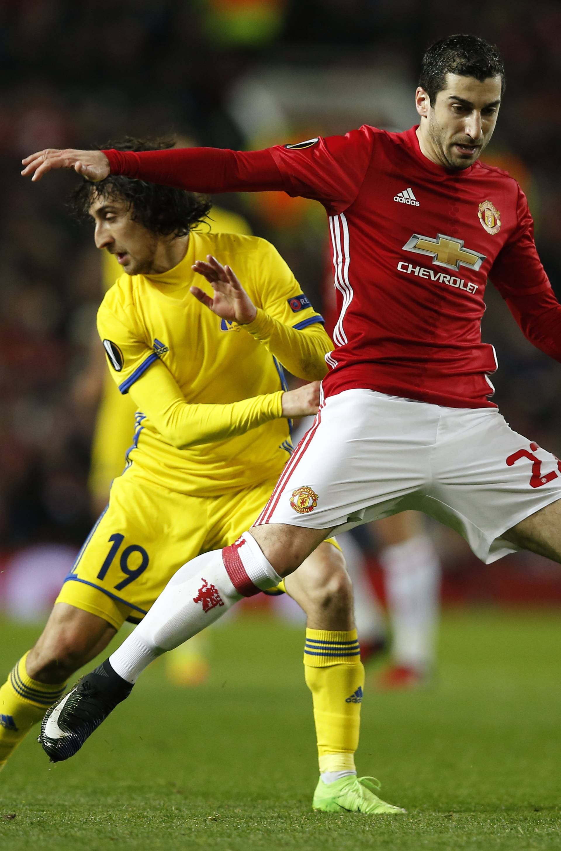Manchester United's Henrikh Mkhitaryan in action with FC Rostov's Khoren Bayramyan