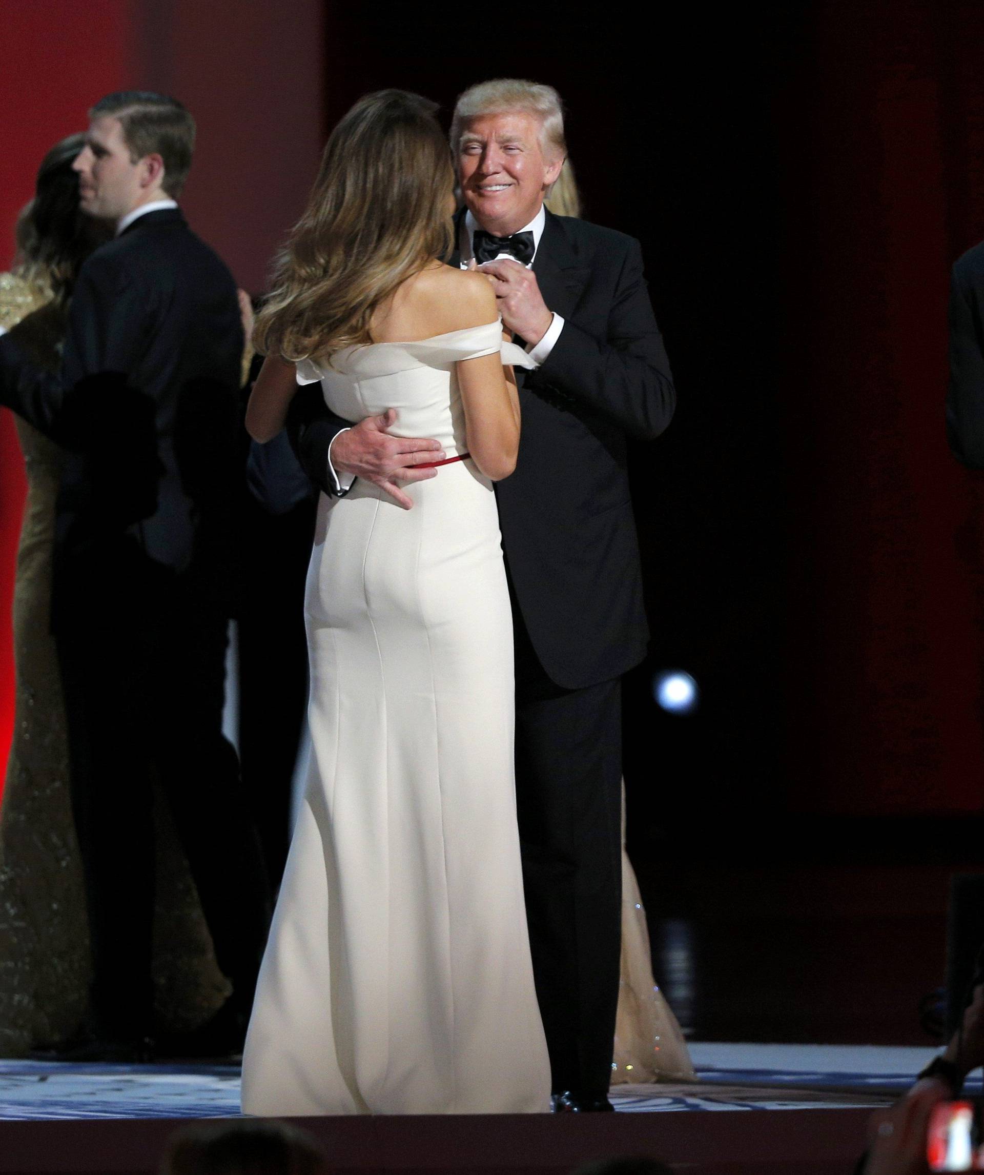 U.S. President Donald Trump and his wife, first lady Melania Trump, dance their first dance as first couple to the song "My Way" at his "Liberty" Inaugural Ball in Washington