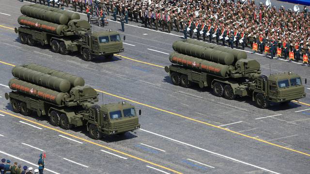 FILE PHOTO: RuRussian S-400 Triumph/SA-21 Growler medium-range and long-range surface-to-air missile systems drive during the Victory Day parade at Red Square in Moscow
