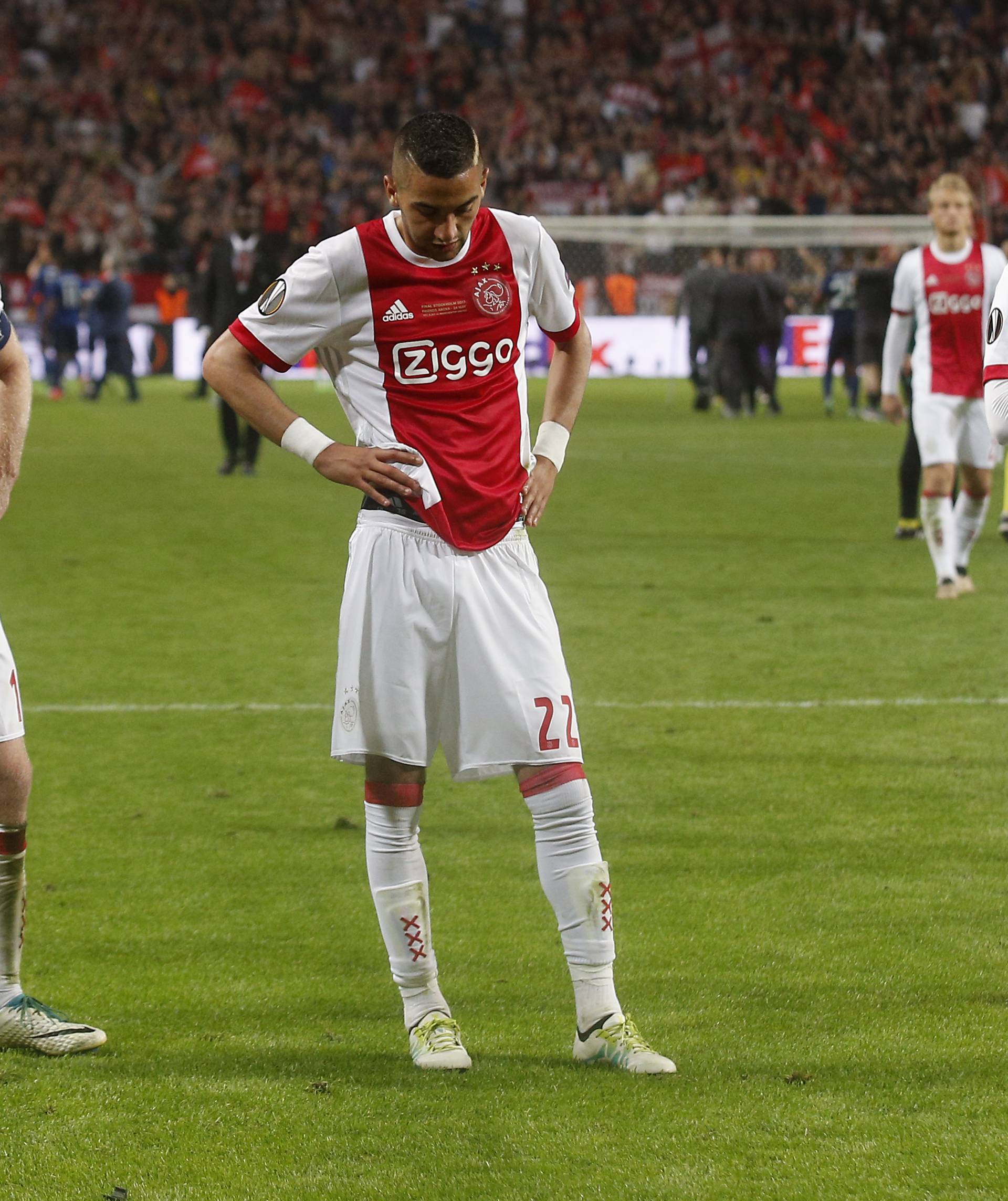 Ajax's Hakim Ziyech looks dejected after the match