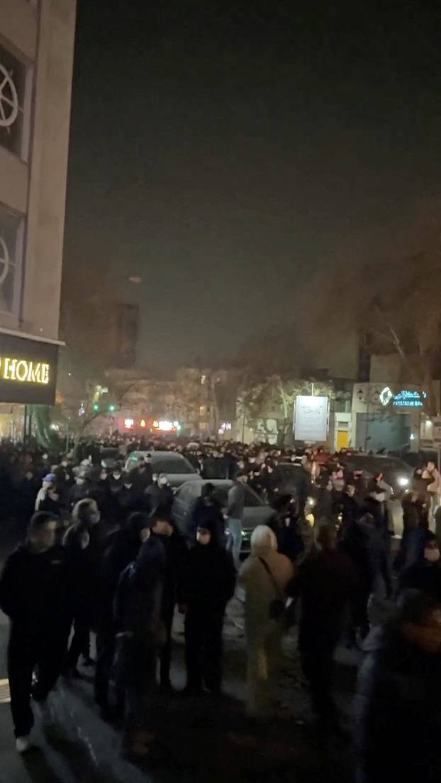 People gather on the streets amid anti-government unrest in Tehran
