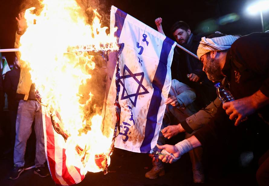 People gather after a two-week ceasefire in the Iran war was announced, in Tehran