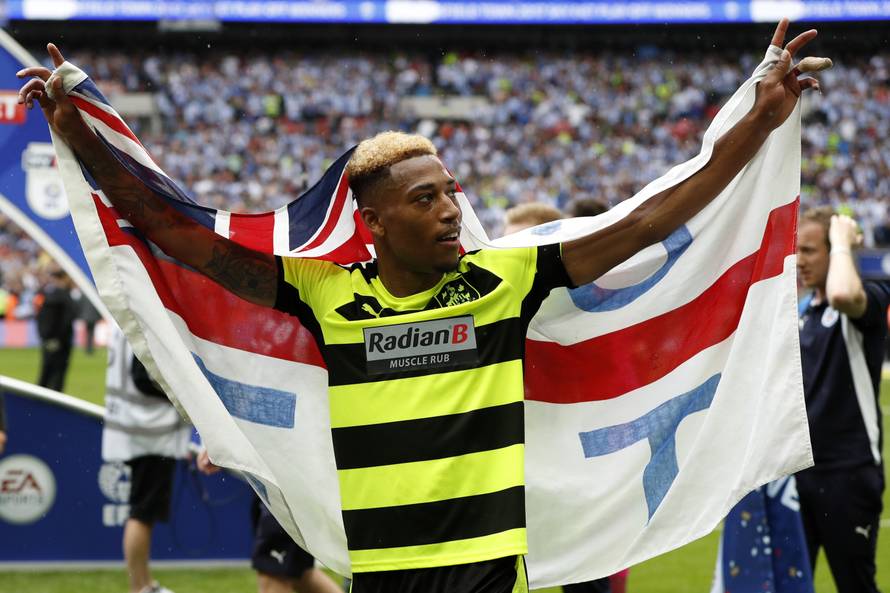 Huddersfield Town's Rajiv van La Parra celebrates after winning the Sky Bet Championship Play-Off Final and getting promoted to the Premier League