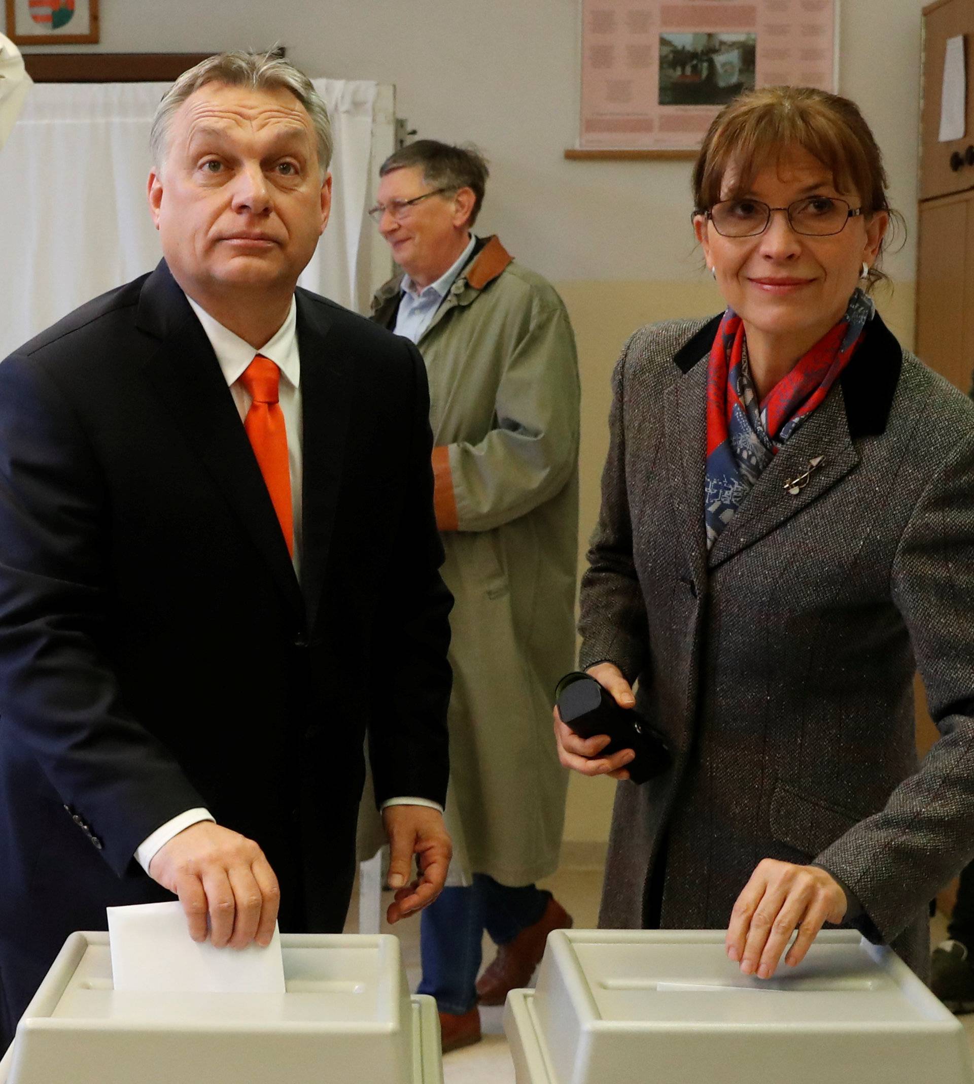 Current Hungarian Prime Minister Viktor Orban and his wife Aniko Levai cast their ballots during Hungarian parliamentary election in Budapest