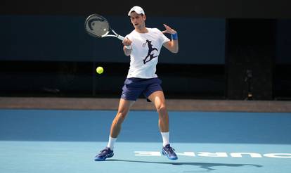 Novak Djokovic practices at Melbourne Park in Melbourne