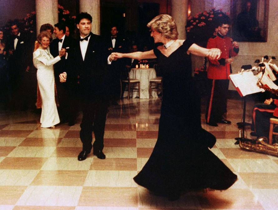 FILE PHOTO: Britain's Princess Diana is shown wearing a Victor Edelstein gown as she dances at a November 9, 1985 White House dinner with actor John Travolta, in Washington