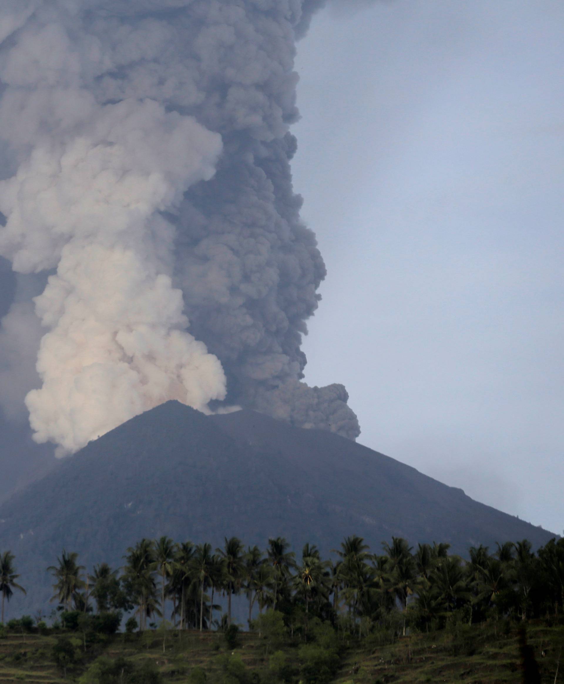 A view of Mount Agung volcano erupting from Culik village in Karangasem, Bali