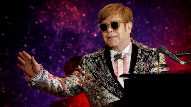 FILE PHOTO: Singer Elton John performs before announcing his final "Farewell Yellow Brick Road" tour in Manhattan