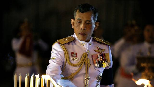 FILE PHOTO: Thailand's Crown Prince Maha Vajiralongkorn attends an event commemorating the death of King Chulalongkorn, known as King Rama V, as he joins people during the mourning of his father, the late King Bhumibol Adulyadej