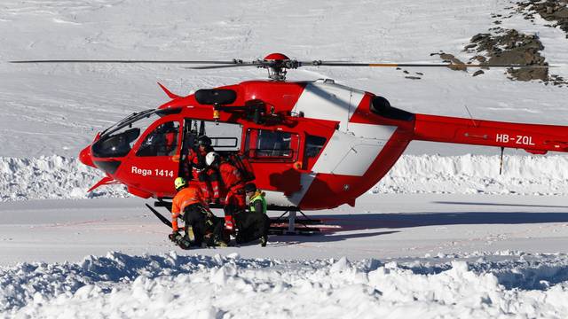 Swiss rescue teams take part in a life-saving exercise after an avalanche at the Glacier 3000 in Les Diablerets