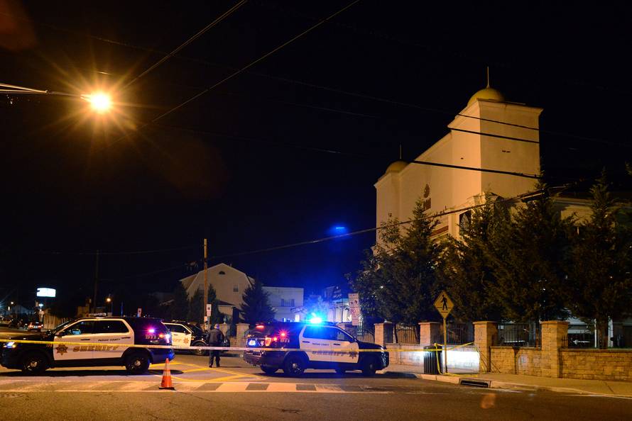 Patterson Police Department vehicles block off a street in front of a mosque in Patterson following the pickup truck attack in New York City
