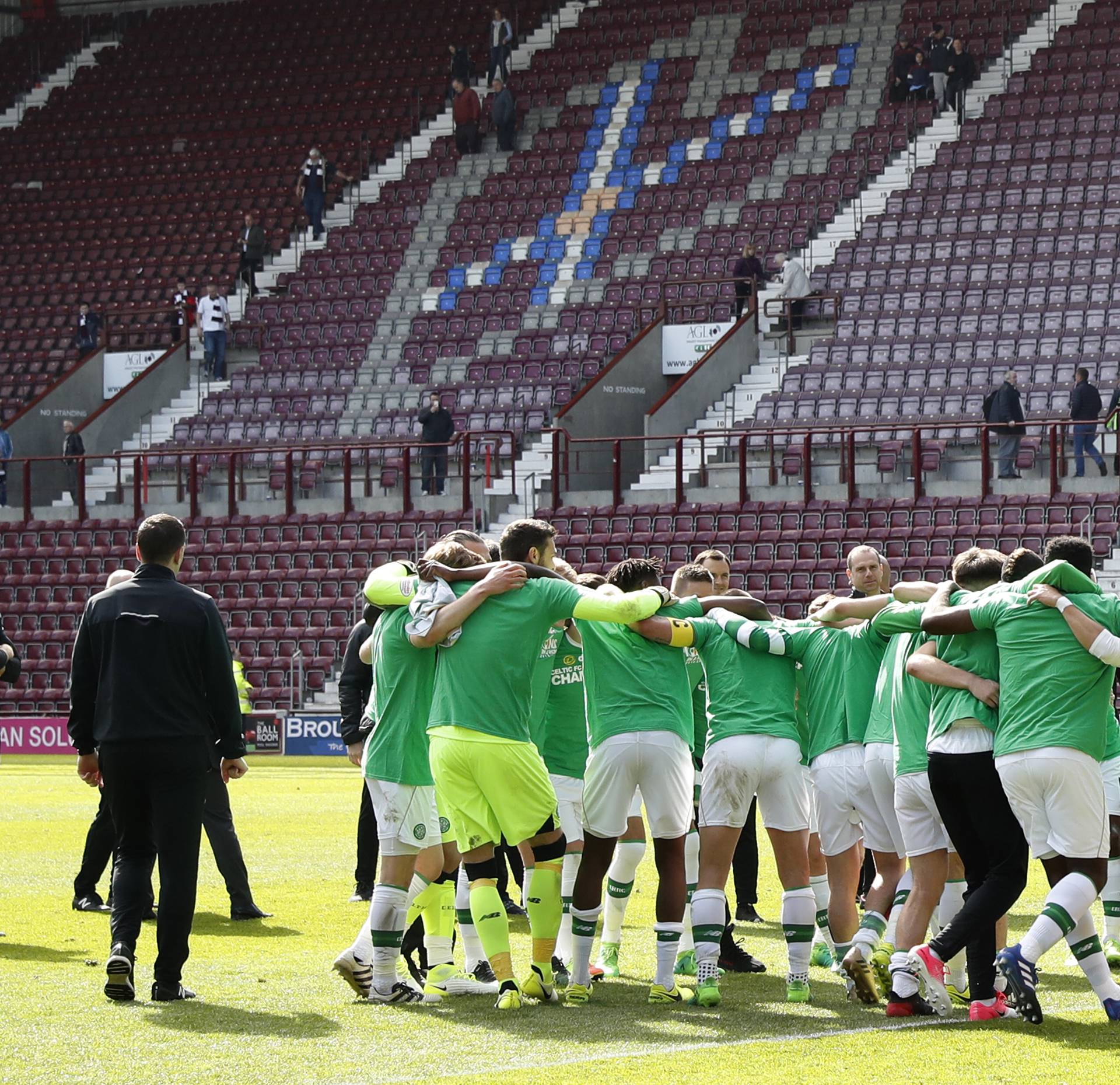 Celtic manager Brendan Rodgers and their players celebrate winning the Scottish Premiership