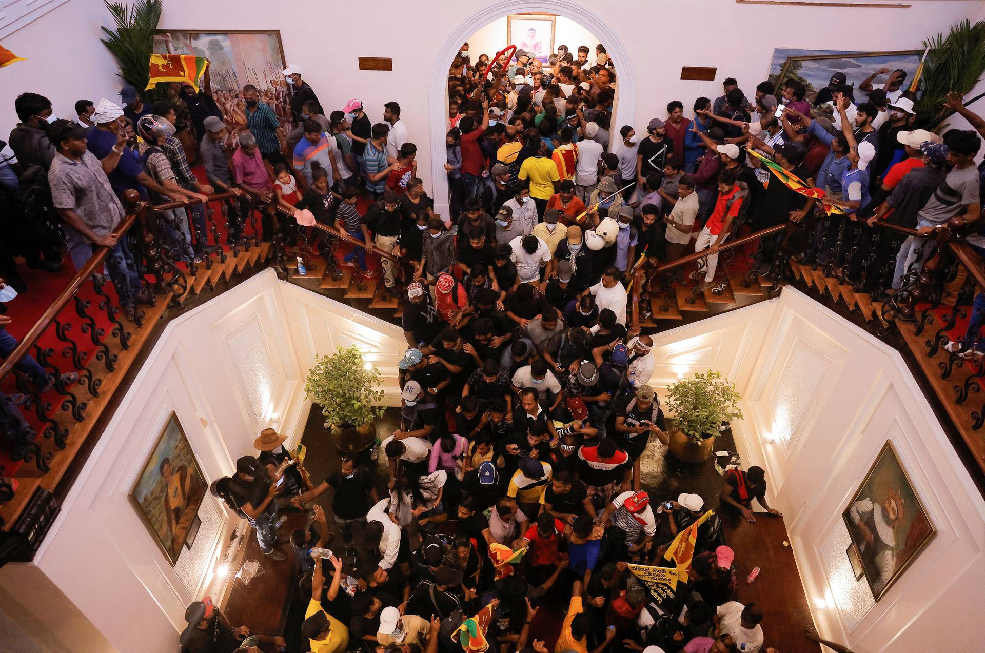 Demonstrators protest inside the President's House, after President Gotabaya Rajapaksa fled, in Colombo