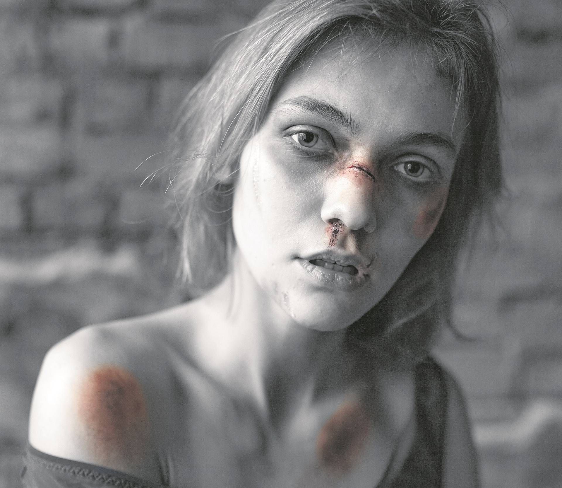 Portrait of sad woman victim of domestic violence and abuse with