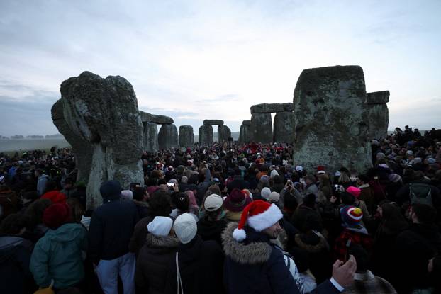 Winter solstice celebrations during sunrise at Stonehenge