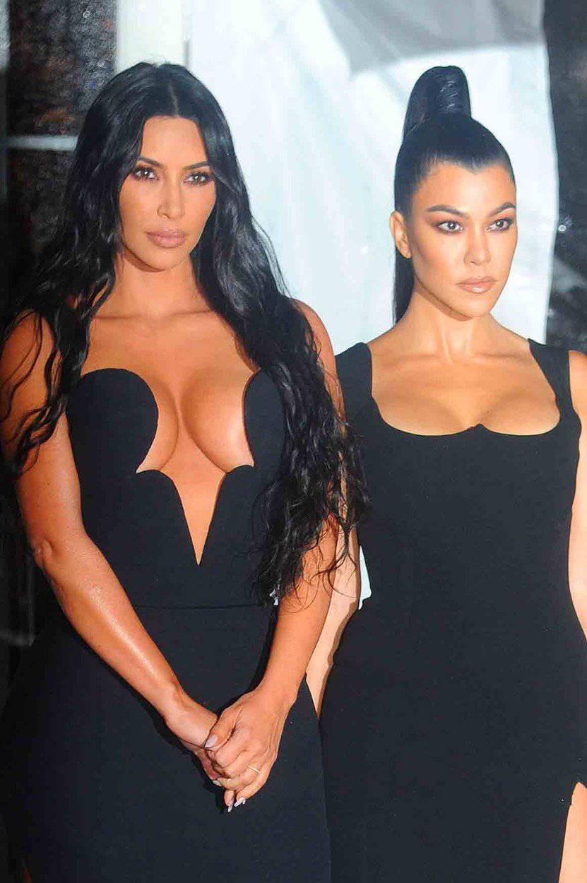 Kim and Kourtney Kardashian arrives to the amfAR Gala at Cipriani Wall Street