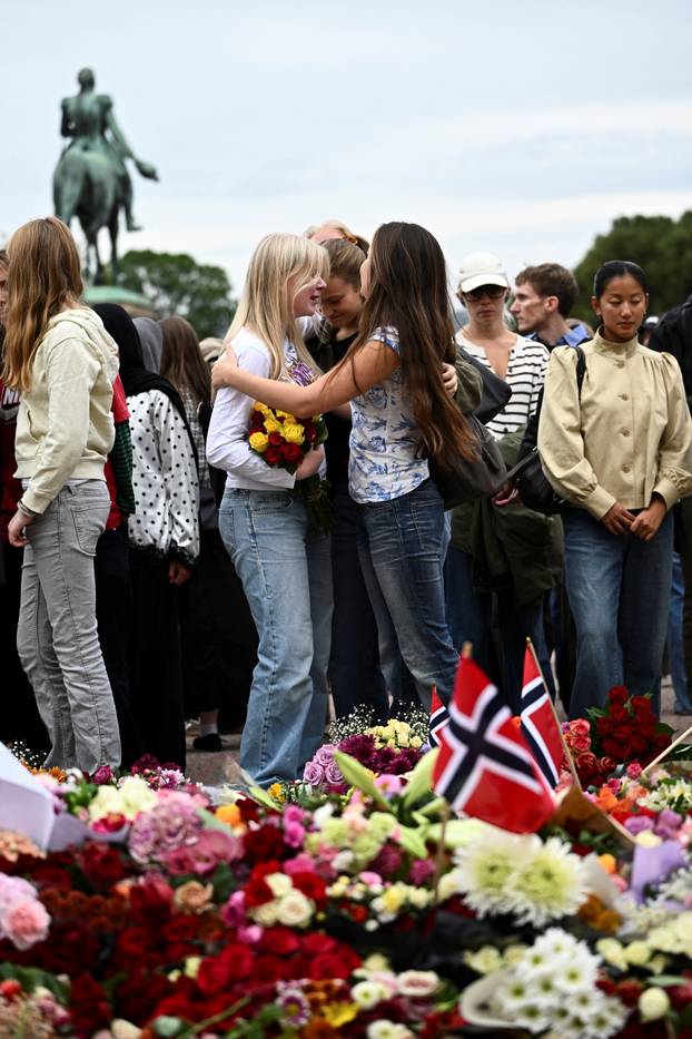 Mourners gather outside the Royal Palace, following the death of Norway's King Harald, in Oslo