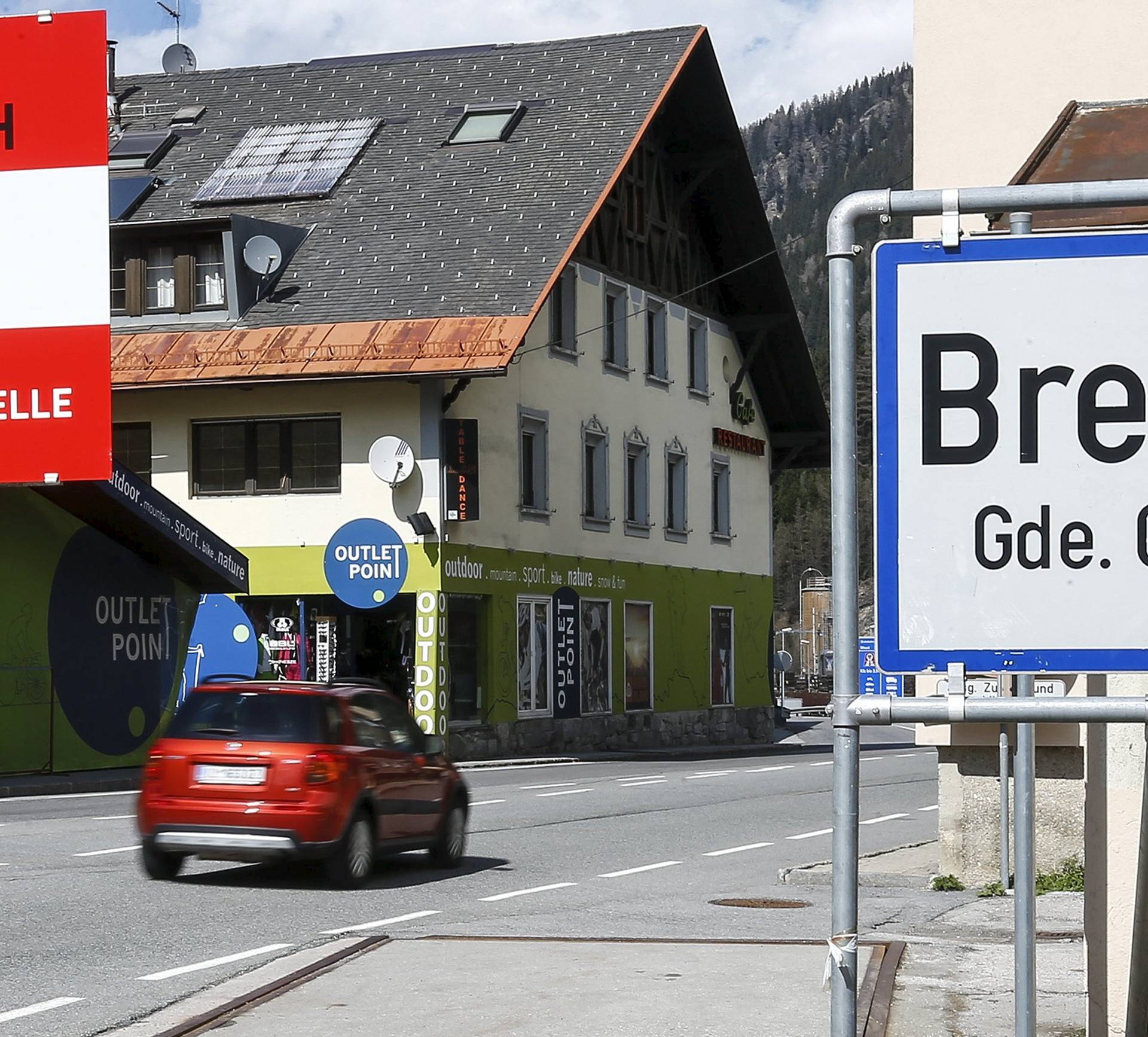 A sign reading "Republic of Austria - border control" is seen at Brenner on the Italian-Austrian border