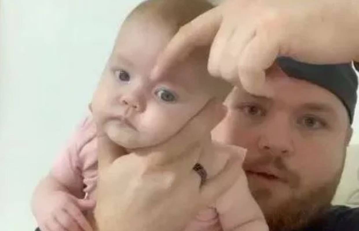 Umorni tata pokazao genijalan trik kako bebu uspavati u trenu