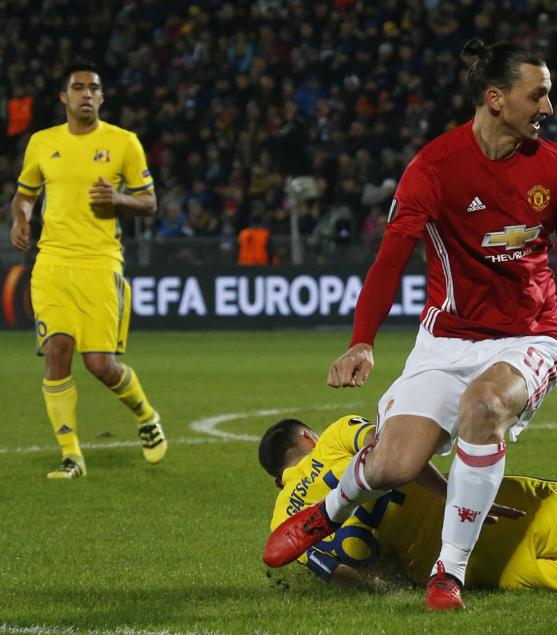 FC Rostov's Aleksandru Gatcan in action with Manchester United's Zlatan Ibrahimovic