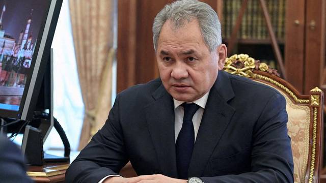 FILE PHOTO: Russia's President Vladimir Putin meets with Defence Minister Sergei Shoigu in Moscow