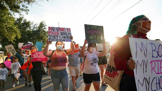 Supporters of reproductive choice take part in the nationwide Women's March in Texas