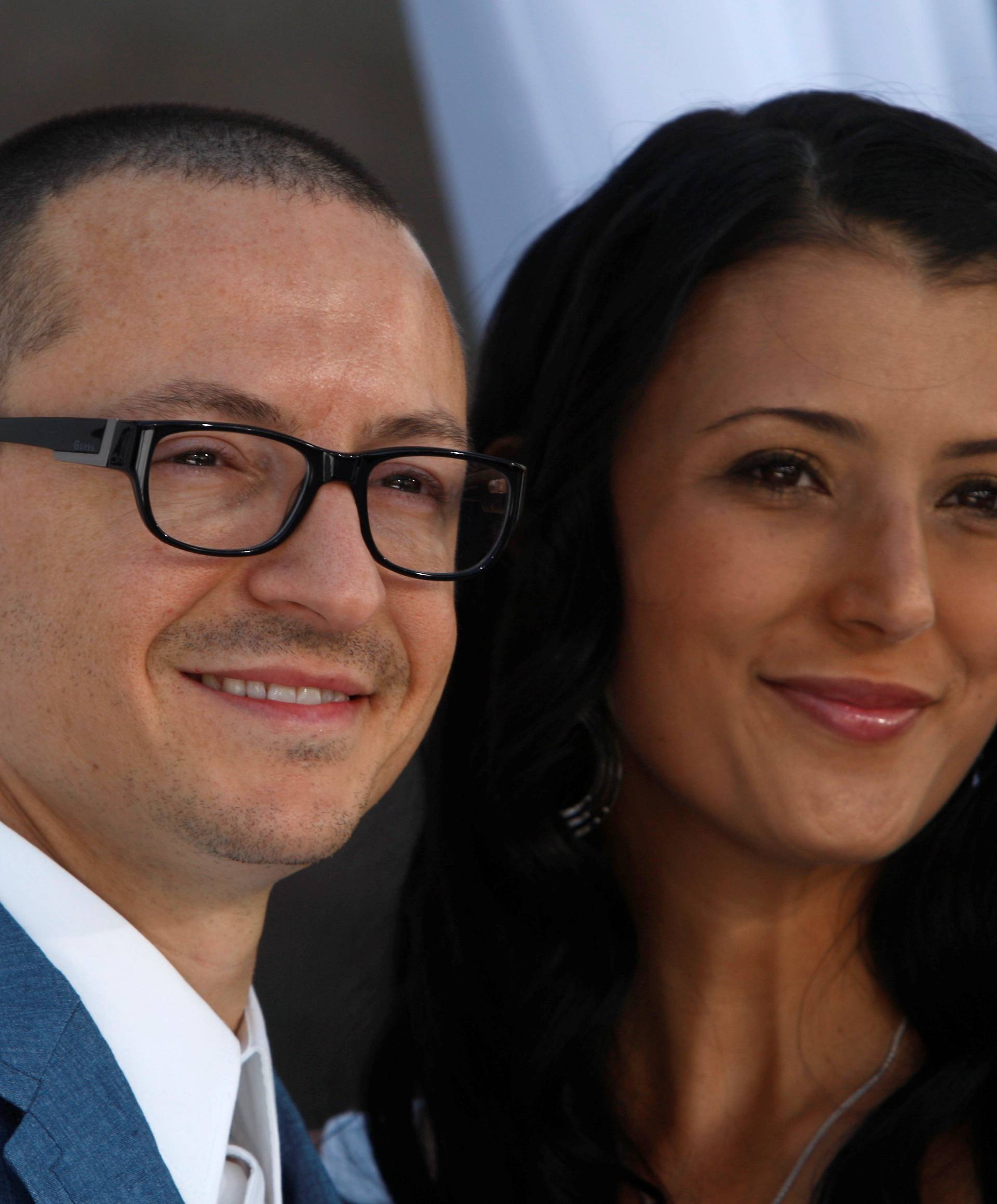 FILE PHOTO: Chester Bennington of Linkin Park and wife Talinda arrive at the 2012 Billboard Music Awards in Las Vegas