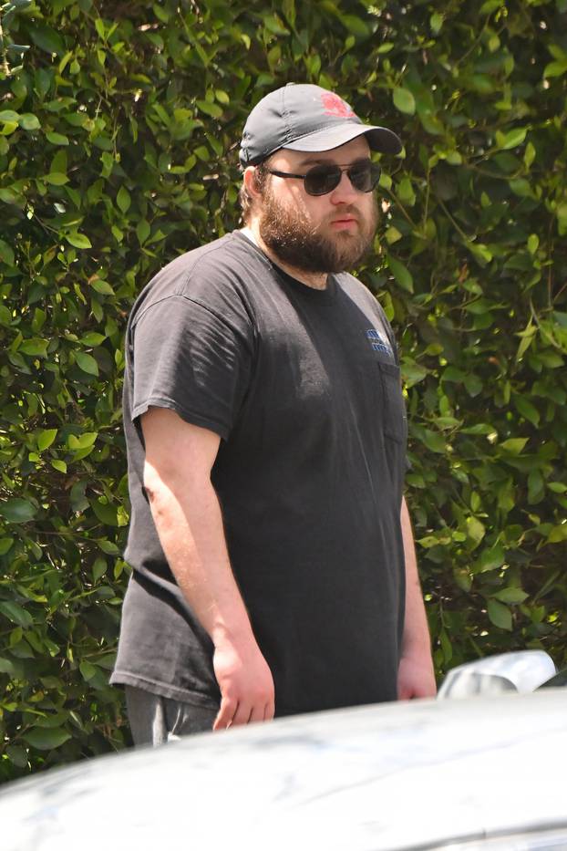 EXCLUSIVE: Two and a half Men star Angus T Jones has two trucks full of 'junk' hauled away from his home in Los Angeles