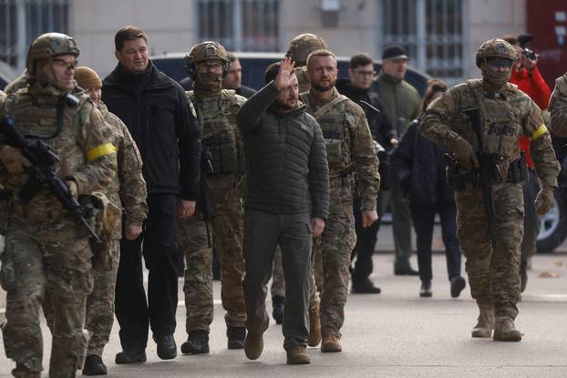 Ukraine’s President Zelenskiy arrives for a flag rising in central Kherson